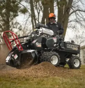 Bandit stump grinder working on a stump